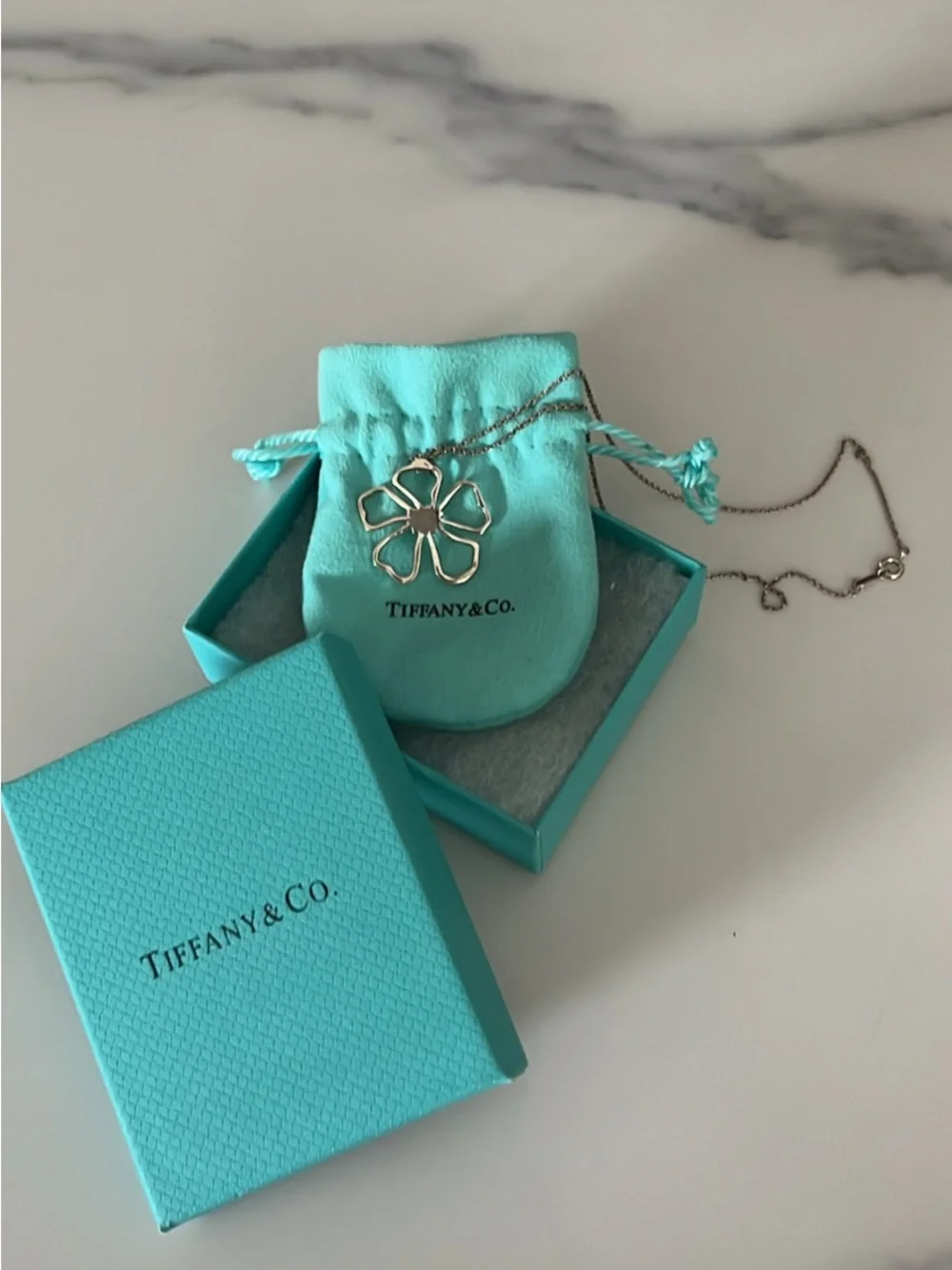 Tiffany & Co. Retired Sterling, silver hibiscus pendant necklace.